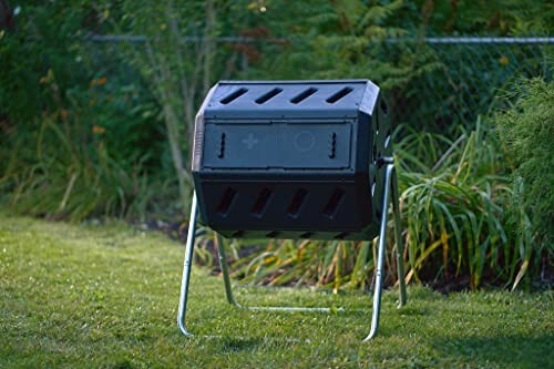 Black compost bin in a garden.