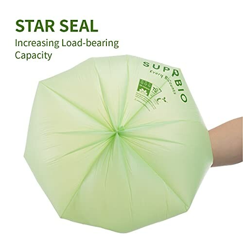 Green biodegradable bag with star seal for increased load-bearing capacity.